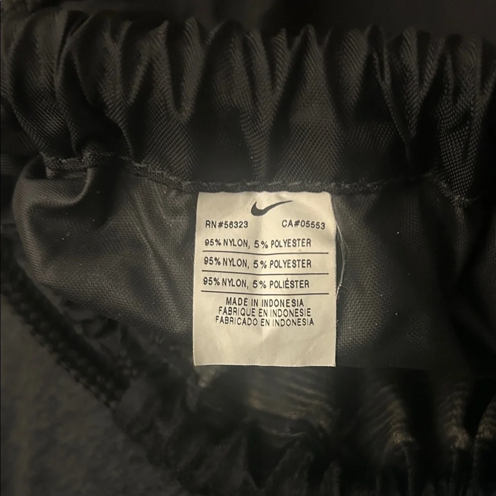 Nike Black Drawstring Backpack with White Swoosh